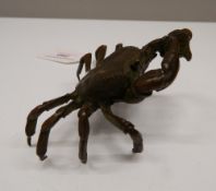 A large Japanese bronze model of a crab. 5.5 cm high; 9.5 cm wide.