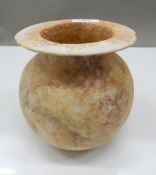 An antique Egyptian alabaster vase. 15.5 cm high.