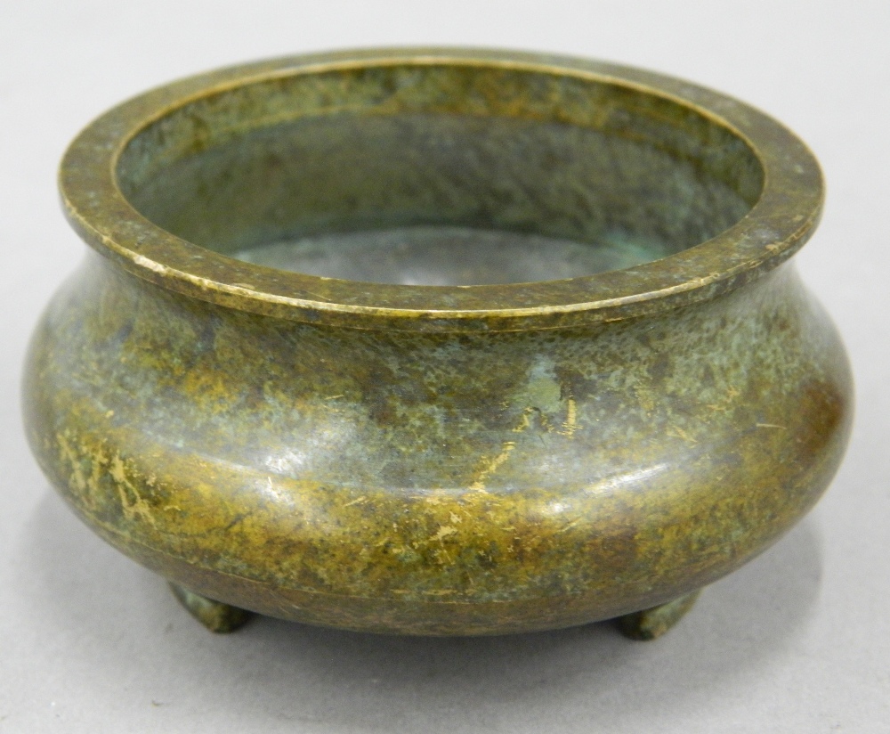 A small Chinese bronze censer. 7 cm diameter.