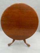 A Victorian mahogany tilt top breakfast table. 118 cm diameter.