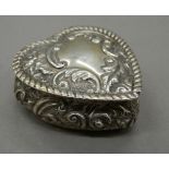 A silver heart shaped trinket box. 5 cm wide (32.5 grammes).