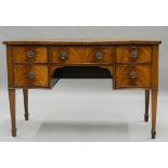 A mahogany serpentine sideboard. 122 cm wide.