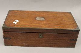 A 19th century brass bound mahogany writing slope. 50.5 cm wide.