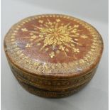 An 18th/19th century leather box and two shagreen boxes. The former 10 cm diameter.