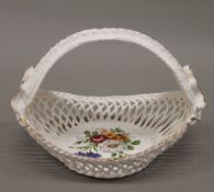 A Herend porcelain basket. 16 cm wide.