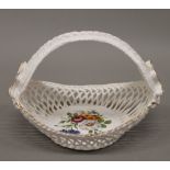 A Herend porcelain basket. 16 cm wide.