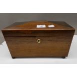 A Victorian rosewood tea caddy. 30.5 wide x 17 cm high.