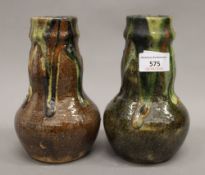 A pair of Art Pottery vases. 18.5 cm high.