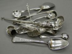 A small quantity of silver and plated spoons, etc. Largest spoon 14.5 cm long (112.