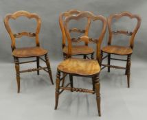 A set of four Victorian mahogany balloon back chairs