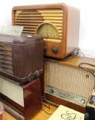 Four vintage radios. The largest 73 cm wide.