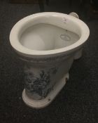 A Victorian blue and white porcelain toilet. 35.5 cm wide.