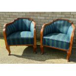 Two early 20th century upholstered tub chairs. 67 cm wide.