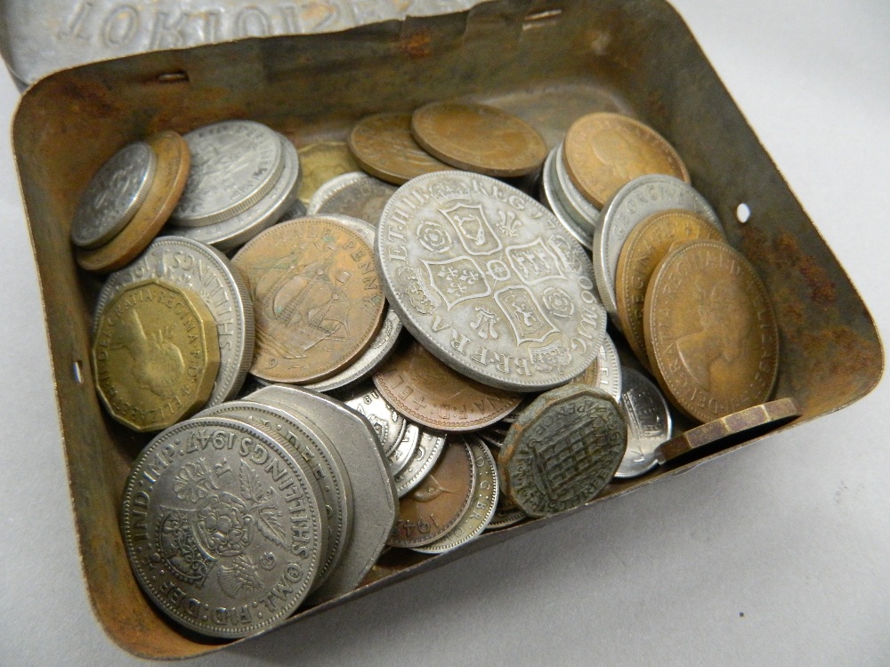 A tin of miscellaneous coins,