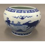 A Chinese porcelain blue and white vase. 10 cm high.