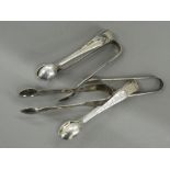 Four sets of silver tongs and a set of plated tongs. Largest 12 cm long (115.