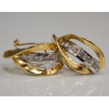 A pair of 18 ct yellow and white gold set earrings (3.