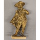 A gilt spelter model of a cavalier. 20 cm high.