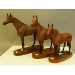 Three Beswick racehorses, including Arkle and Mill Reef. The largest 30 cm high.