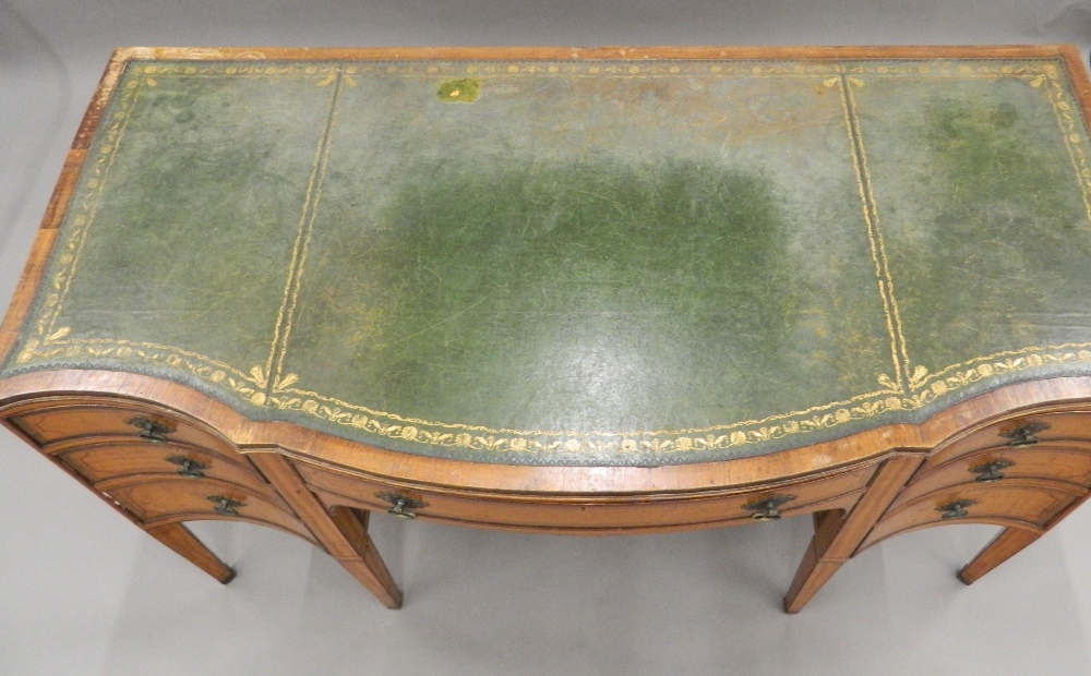 A 19th century satinwood sideboard, adapted to a desk. 132 cm wide. - Image 2 of 5