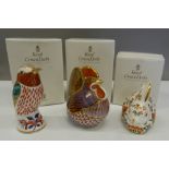 Three boxed Royal Crown Derby paperweights (all with stoppers), including Meadow Rabbit,