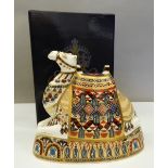 A large boxed Royal Crown Derby paperweight, formed as a camel (with stopper). 20 cm wide.