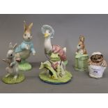 A quantity of Beswick and Royal Albert Beatrix Potter models, including Mrs Tiggy-Winkle,