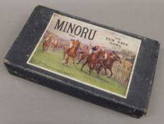 Minoru Race Game and a picture book. The box 39 cm wide.