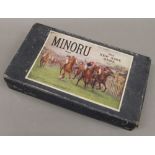 Minoru Race Game and a picture book. The box 39 cm wide.