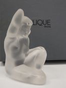 A boxed Lalique model of a nude female. 10 cm high.