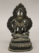 A bronze model of Buddha. 17 cm high.