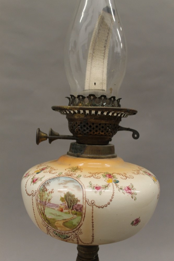 A Victorian oil lamp. 60 cm high. - Image 2 of 2