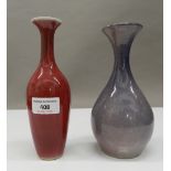 A Chinese sang de boeuf glazed vase and a Chinese lavender glazed vase. The former 19.5 cm high.