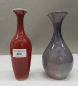 A Chinese sang de boeuf glazed vase and a Chinese lavender glazed vase. The former 19.5 cm high.
