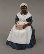 A Royal Doulton figurine, The Royal Governor's Cook HN 2233. 14.5 cm high.