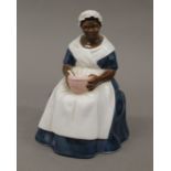 A Royal Doulton figurine, The Royal Governor's Cook HN 2233. 14.5 cm high.