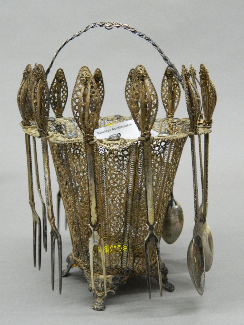 An 800 silver filigree basket set. 21 cm high (14.