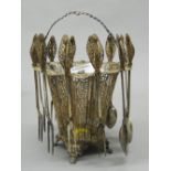 An 800 silver filigree basket set. 21 cm high (14.