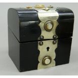 A Victorian ebonised casket containing cut glass perfume bottles, with key. 9.5 cm high.