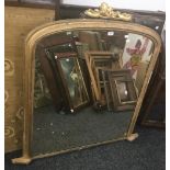 A Victorian gilt framed overmantle mirror. 115 cm wide, 122 cm high overall (106.