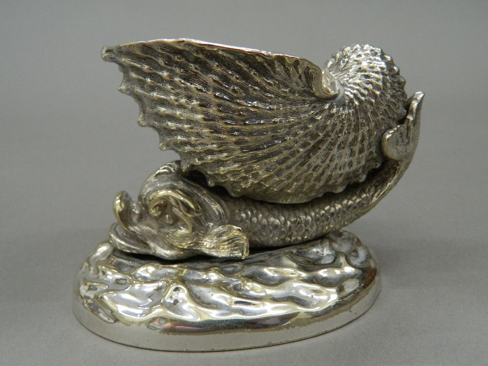 A pair of silver plated dolphin form table salts. 7.5 cm high. - Image 2 of 4