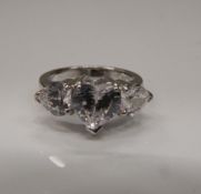 A silver and cubic zirconia ring. Ring size M.