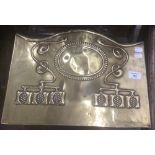 An Art Nouveau brass fireplace hood. 40.5 cm wide.