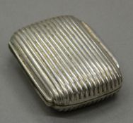 A 19th century silver plated snuff box. 5.5 cm wide.