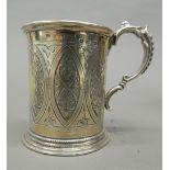A silver Christening mug. 8.5 cm high (4.