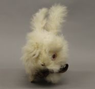 A vintage clockwork bunny rabbit. 15 cm high.