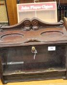 Two vintage counter top cigar cabinets. The largest 39 cm wide.