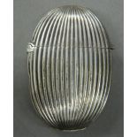 A Victorian silver vesta of oval ribbed form. 5 cm high (16 grammes).