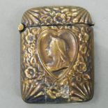 A vesta depicting Queen Victoria. 5.25 cm high.