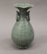 A Chinese celadon vase. 19 cm high.